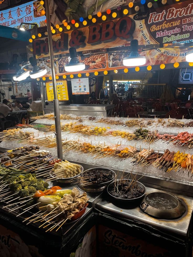 photo · student at KL street food stall